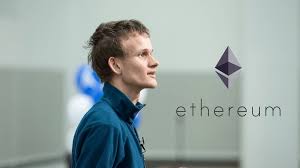 Vitalik Buterin looking at Ethereum Logo